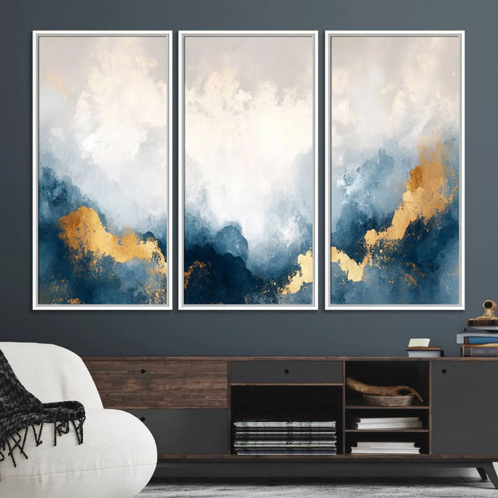 The Abstract Blue and Gold Clouds canvas art enhances the space.