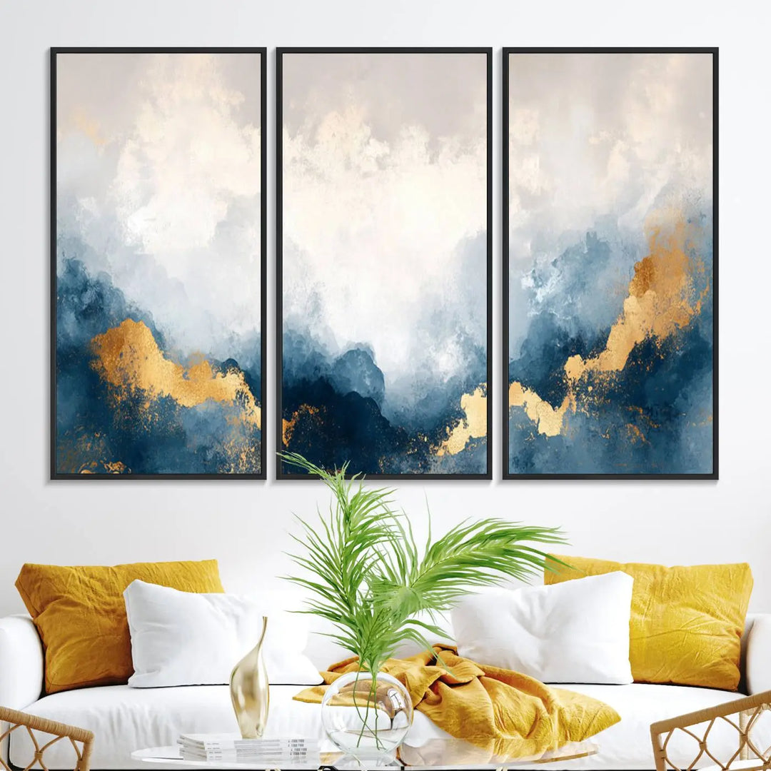 The Abstract Blue and Gold Clouds canvas art enhances the space.