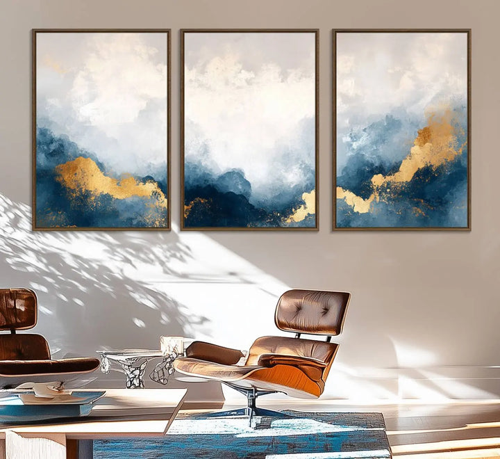 The Abstract Blue and Gold Clouds canvas art enhances the space.