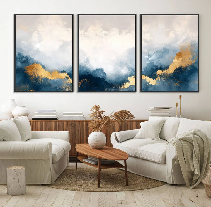 The Abstract Blue and Gold Clouds canvas art enhances the space.