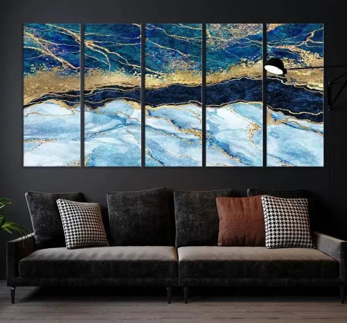 The room features a captivating Abstract Blue and Gold Marble Canvas Print displayed as a large 3-panel wall decor, infusing the space with modern elegance.