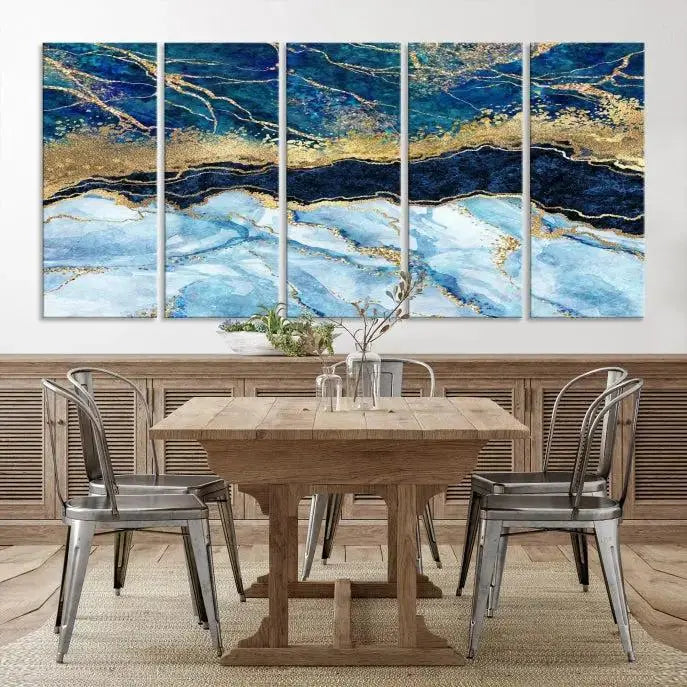 The room features a captivating Abstract Blue and Gold Marble Canvas Print displayed as a large 3-panel wall decor, infusing the space with modern elegance.