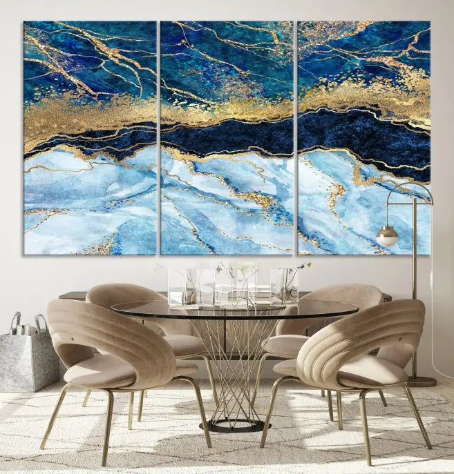 The room features a captivating Abstract Blue and Gold Marble Canvas Print displayed as a large 3-panel wall decor, infusing the space with modern elegance.