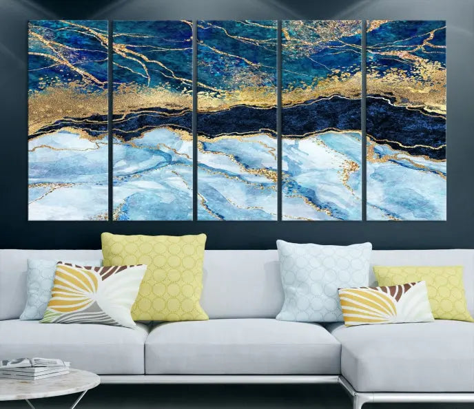 The room features a captivating Abstract Blue and Gold Marble Canvas Print displayed as a large 3-panel wall decor, infusing the space with modern elegance.