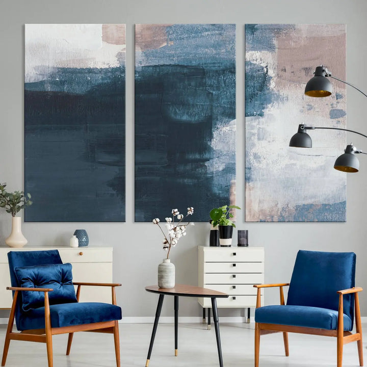 A modern living room featuring the Abstract Brush Strokes Canvas Wall Art on museum-quality canvas.