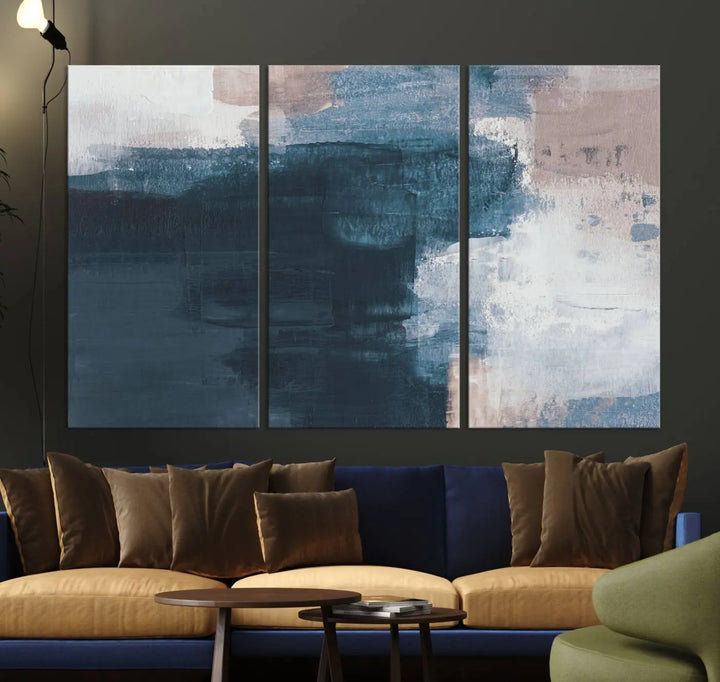 A modern living room featuring the Abstract Brush Strokes Canvas Wall Art on museum-quality canvas.