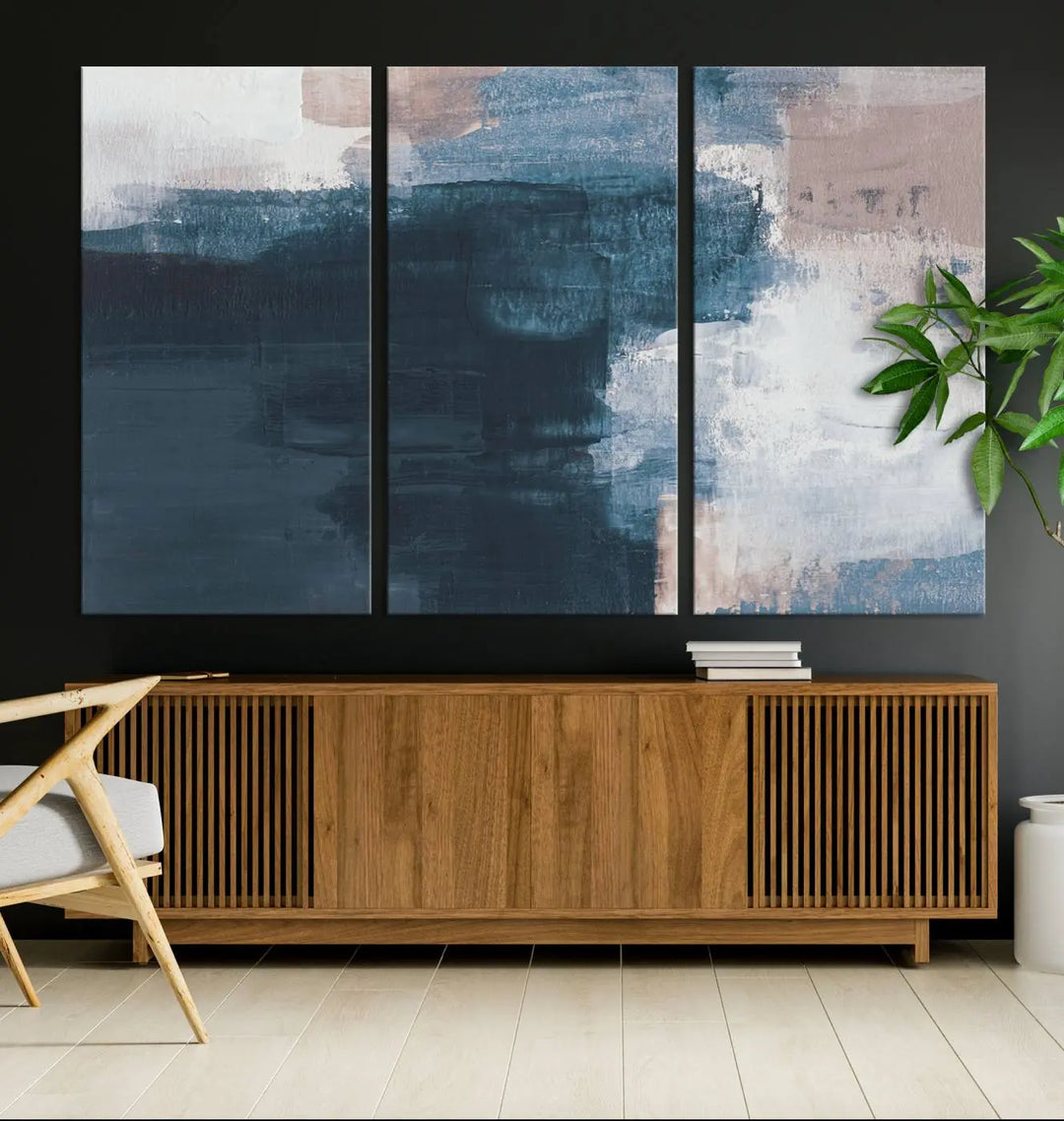 A modern living room featuring the Abstract Brush Strokes Canvas Wall Art on museum-quality canvas.