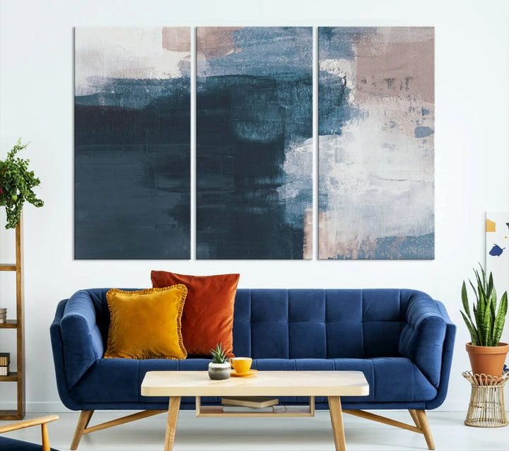 A modern living room featuring the Abstract Brush Strokes Canvas Wall Art on museum-quality canvas.