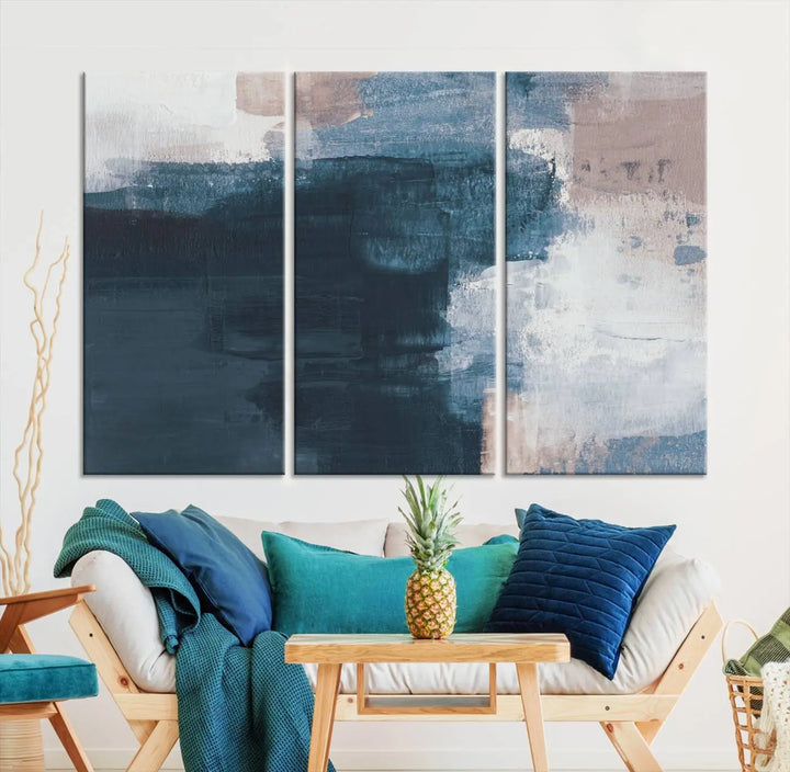 A modern living room featuring the Abstract Brush Strokes Canvas Wall Art on museum-quality canvas.