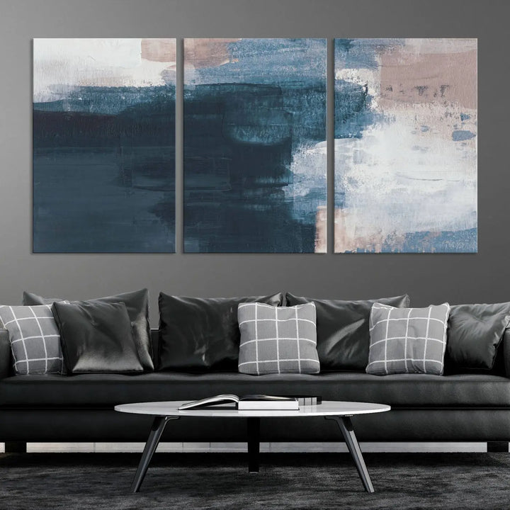 A modern living room featuring the Abstract Brush Strokes Canvas Wall Art on museum-quality canvas.