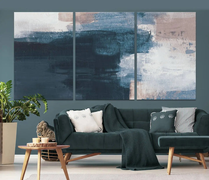 A modern living room featuring the Abstract Brush Strokes Canvas Wall Art on museum-quality canvas.