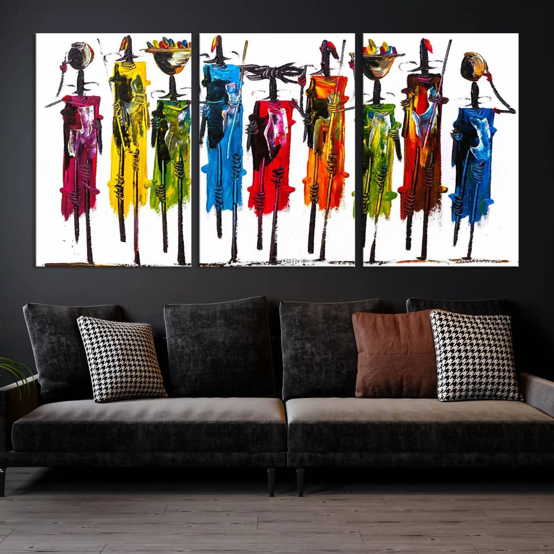 The Abstract Colorful African Women Canvas Wall Art, gallery wrapped for a sleek look, is finished with a UV-protective coating to ensure lasting vibrancy. It hangs on a dark wall, providing an eye-catching focal point.