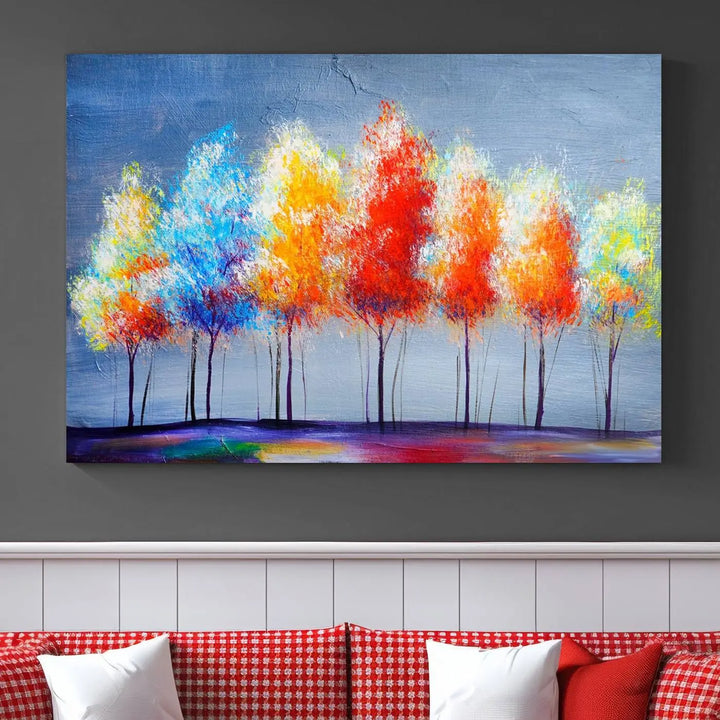 A triptych of the Abstract Colorful Trees Wall Art Canvas Print, gallery-wrapped on museum-quality canvas, adorns the wall.