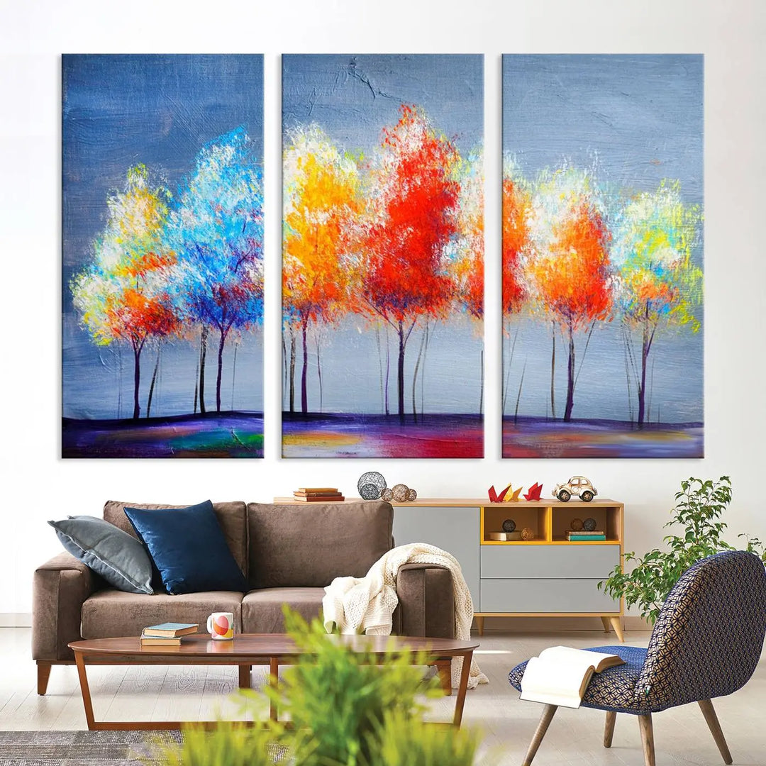 A triptych of the Abstract Colorful Trees Wall Art Canvas Print, gallery-wrapped on museum-quality canvas, adorns the wall.