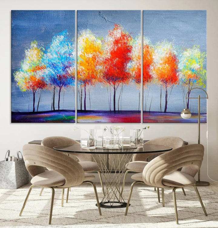 A triptych of the Abstract Colorful Trees Wall Art Canvas Print, gallery-wrapped on museum-quality canvas, adorns the wall.