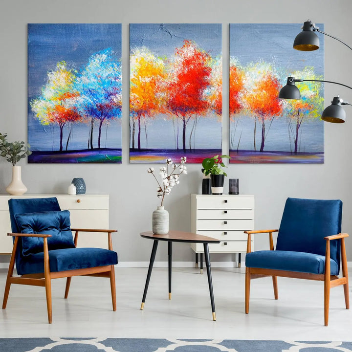 A triptych of the Abstract Colorful Trees Wall Art Canvas Print, gallery-wrapped on museum-quality canvas, adorns the wall.