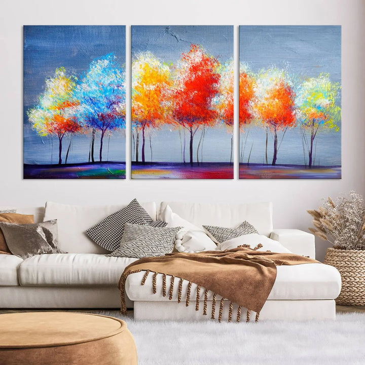 A triptych of the Abstract Colorful Trees Wall Art Canvas Print, gallery-wrapped on museum-quality canvas, adorns the wall.