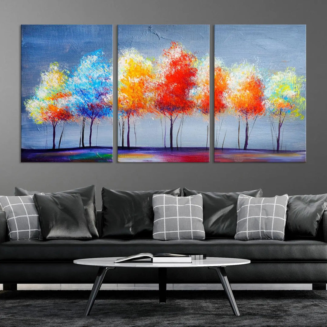 A triptych of the Abstract Colorful Trees Wall Art Canvas Print, gallery-wrapped on museum-quality canvas, adorns the wall.