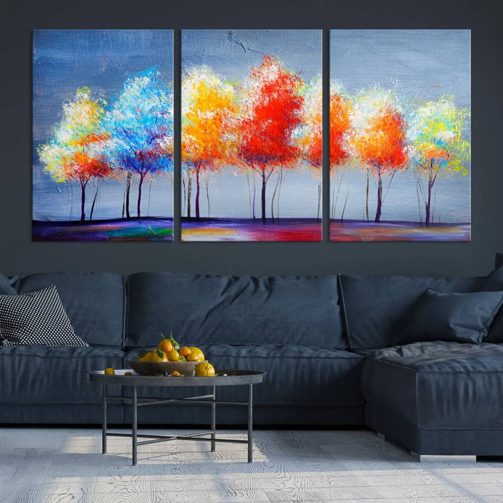 A triptych of the Abstract Colorful Trees Wall Art Canvas Print, gallery-wrapped on museum-quality canvas, adorns the wall.