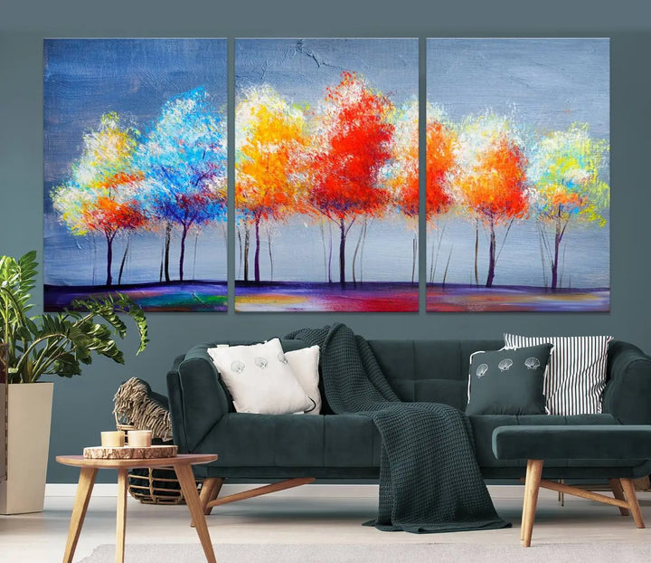 A triptych of the Abstract Colorful Trees Wall Art Canvas Print, gallery-wrapped on museum-quality canvas, adorns the wall.