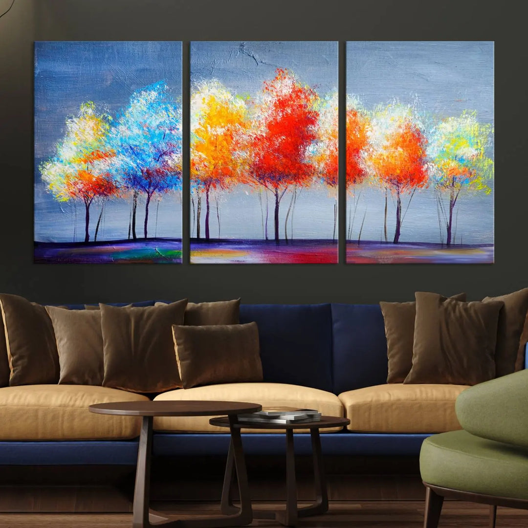 A triptych of the Abstract Colorful Trees Wall Art Canvas Print, gallery-wrapped on museum-quality canvas, adorns the wall.