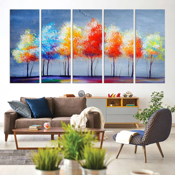 A triptych of the Abstract Colorful Trees Wall Art Canvas Print, gallery-wrapped on museum-quality canvas, adorns the wall.