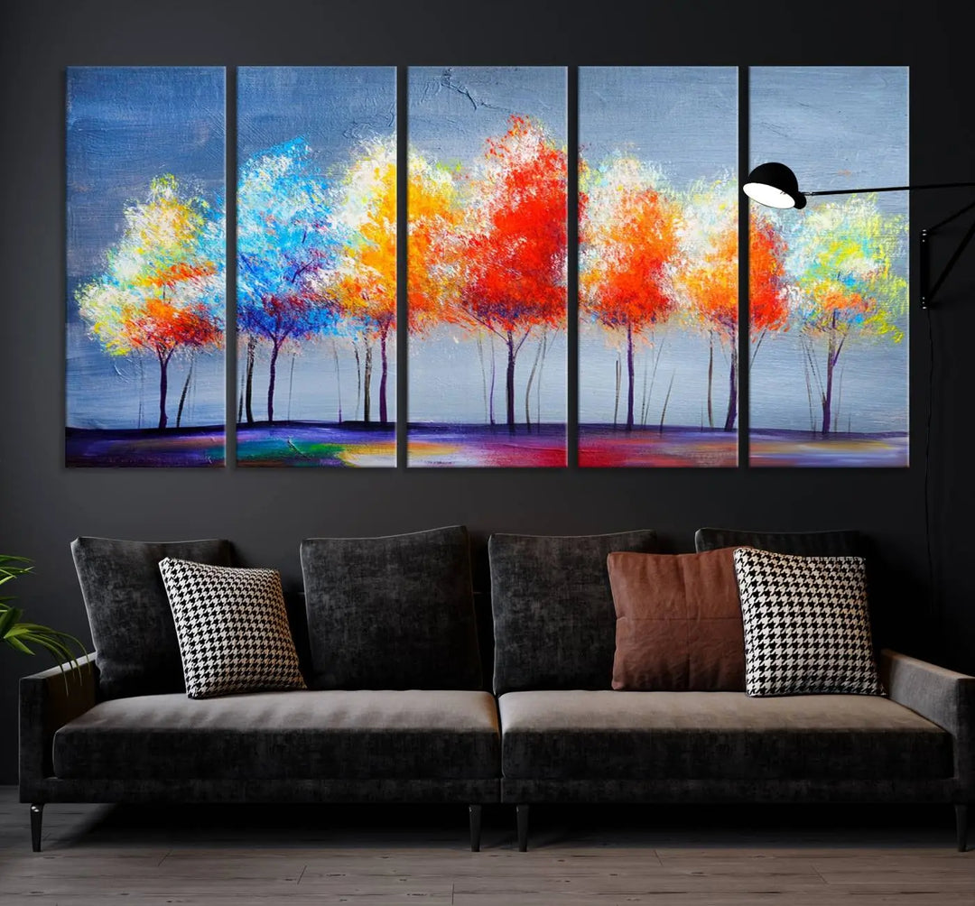 A triptych of the Abstract Colorful Trees Wall Art Canvas Print, gallery-wrapped on museum-quality canvas, adorns the wall.