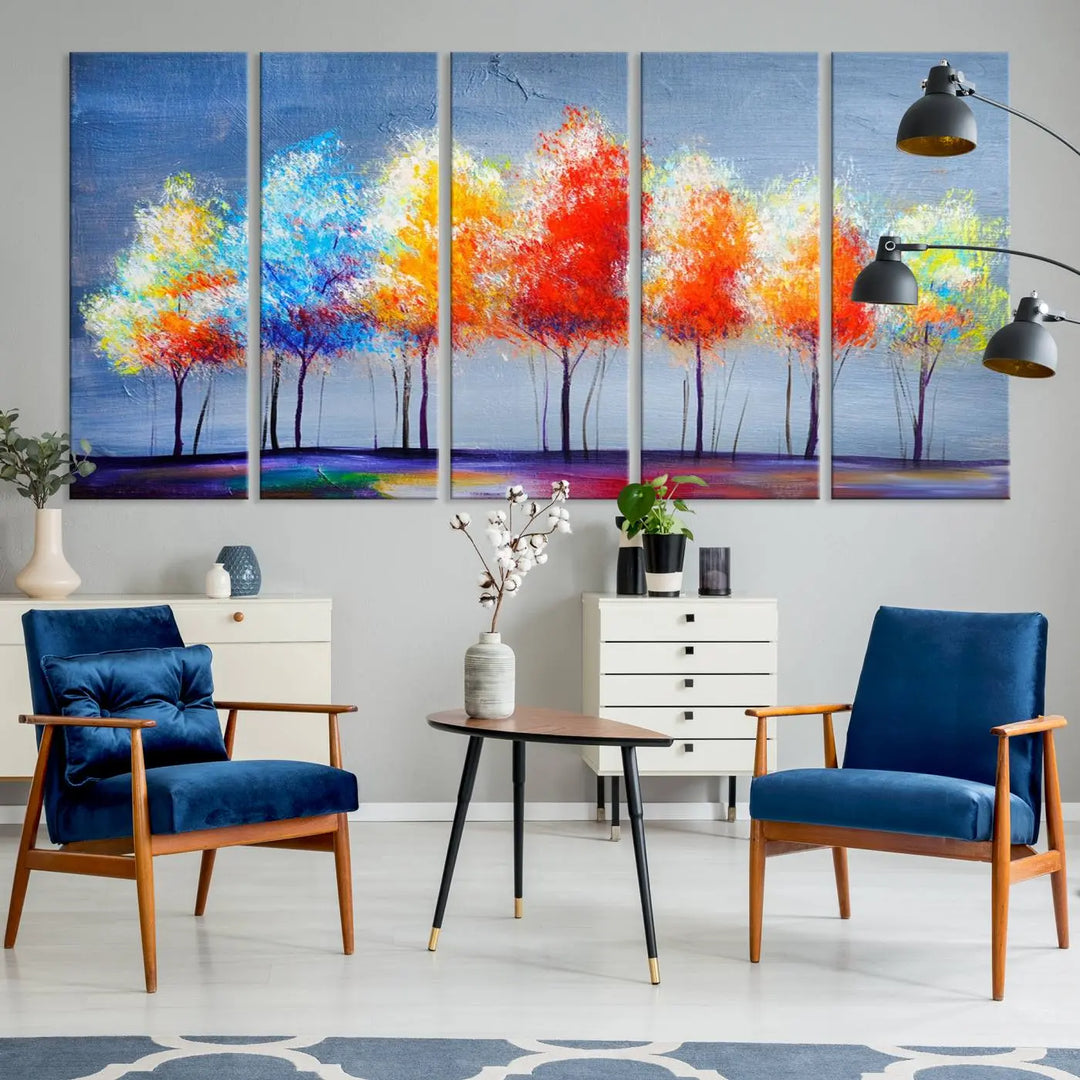 A triptych of the Abstract Colorful Trees Wall Art Canvas Print, gallery-wrapped on museum-quality canvas, adorns the wall.