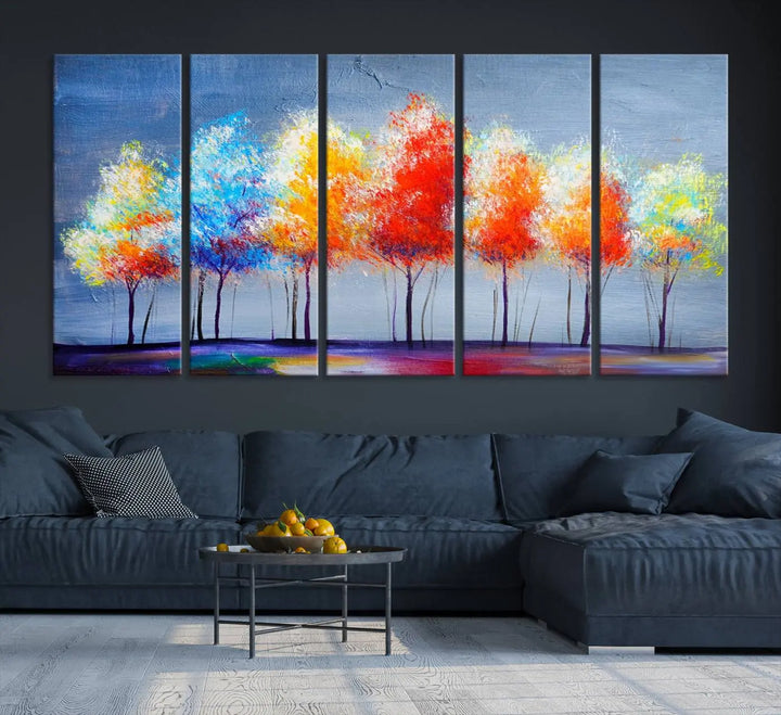 A triptych of the Abstract Colorful Trees Wall Art Canvas Print, gallery-wrapped on museum-quality canvas, adorns the wall.