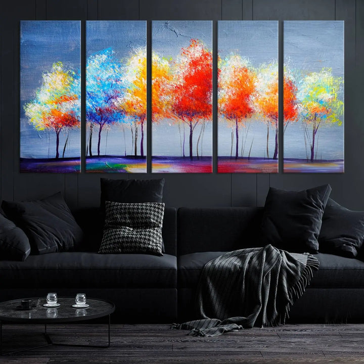 A triptych of the Abstract Colorful Trees Wall Art Canvas Print, gallery-wrapped on museum-quality canvas, adorns the wall.