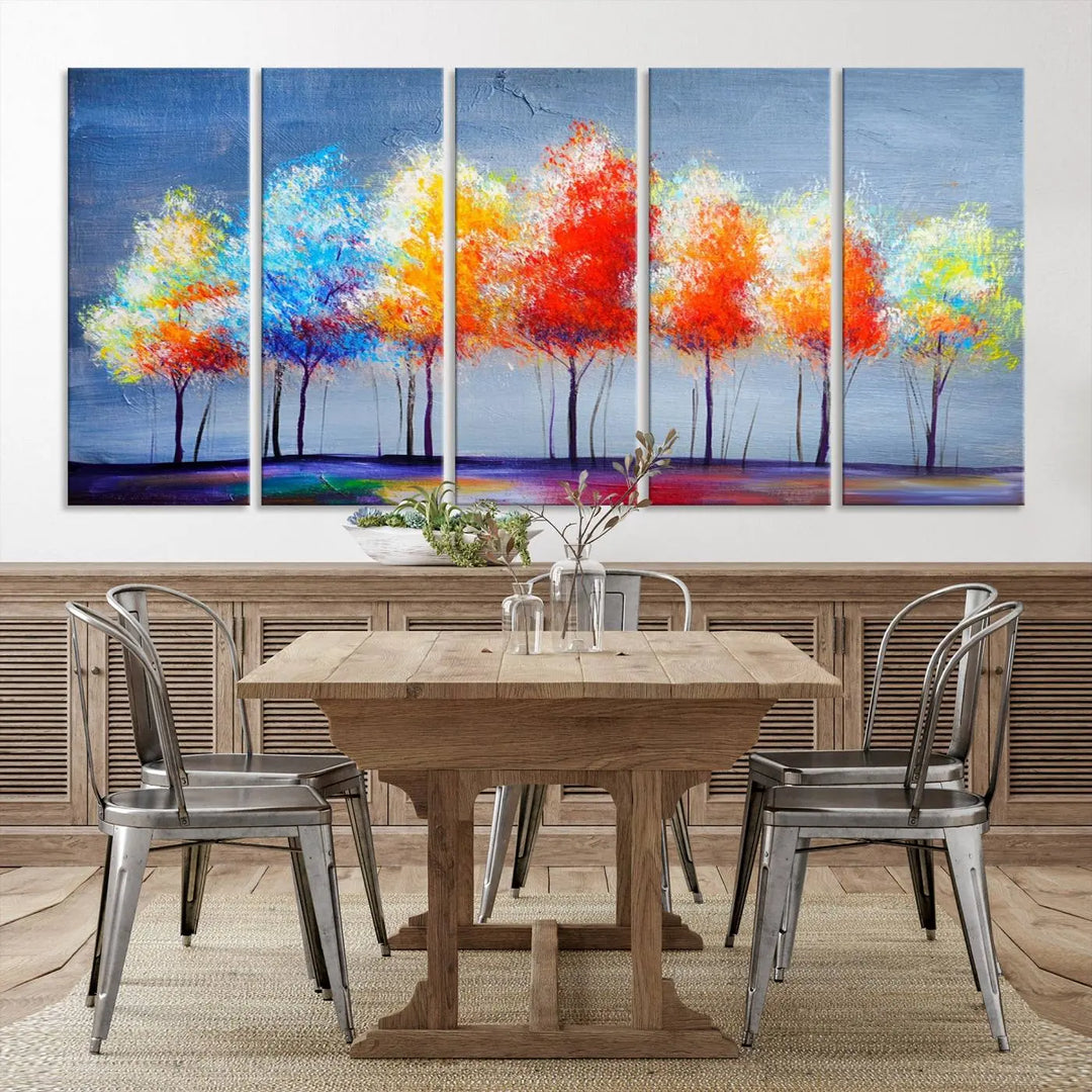 A triptych of the Abstract Colorful Trees Wall Art Canvas Print, gallery-wrapped on museum-quality canvas, adorns the wall.