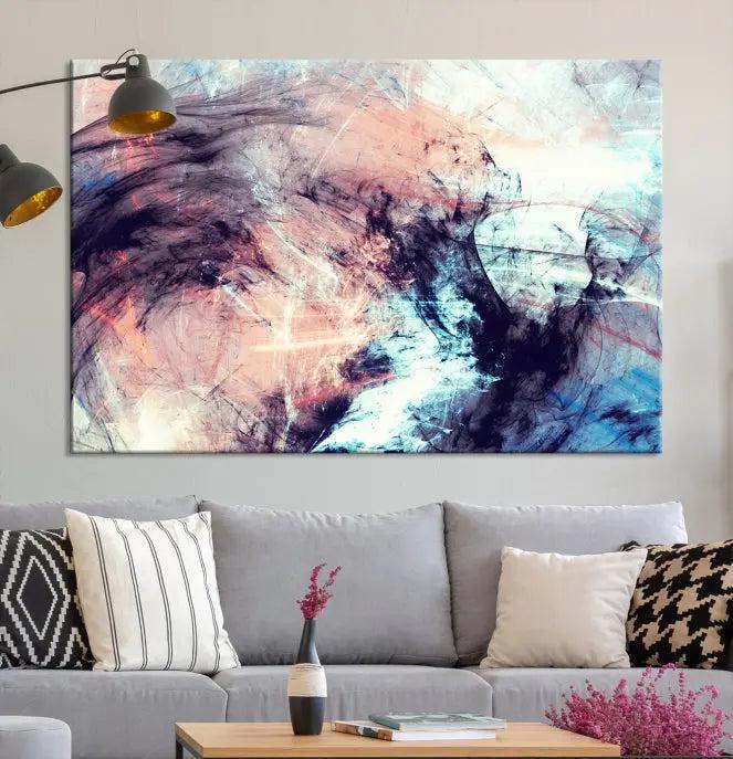 The Abstract Colors Wall Art Canvas Print features a triptych design with swirling purple, pink, and blue hues. This museum-quality piece on polycotton canvas is expertly hand-assembled and comes ready to hang.