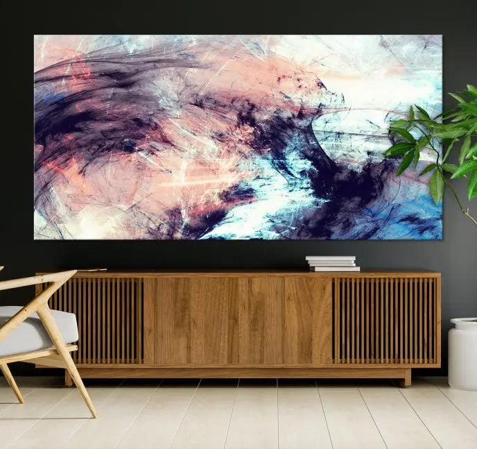 The Abstract Colors Wall Art Canvas Print features a triptych design with swirling purple, pink, and blue hues. This museum-quality piece on polycotton canvas is expertly hand-assembled and comes ready to hang.