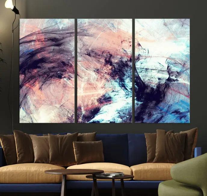 The Abstract Colors Wall Art Canvas Print features a triptych design with swirling purple, pink, and blue hues. This museum-quality piece on polycotton canvas is expertly hand-assembled and comes ready to hang.