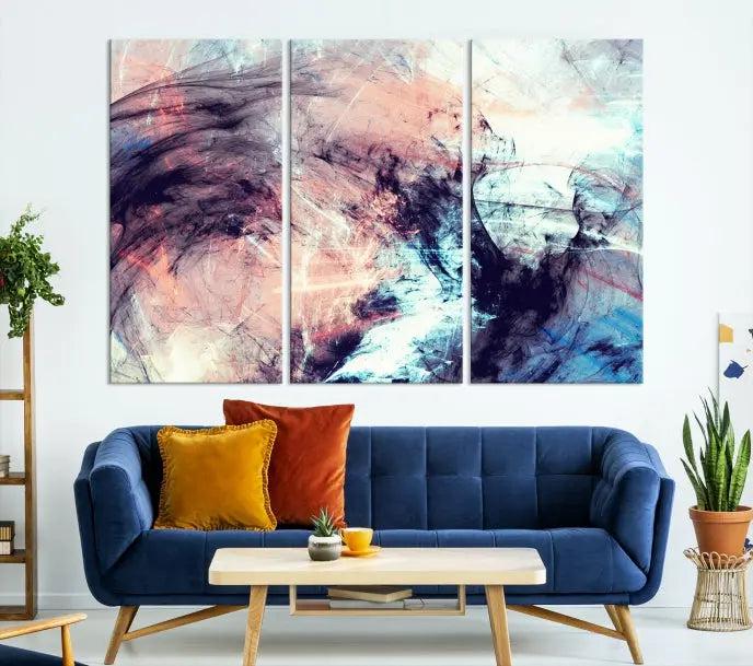 The Abstract Colors Wall Art Canvas Print features a triptych design with swirling purple, pink, and blue hues. This museum-quality piece on polycotton canvas is expertly hand-assembled and comes ready to hang.