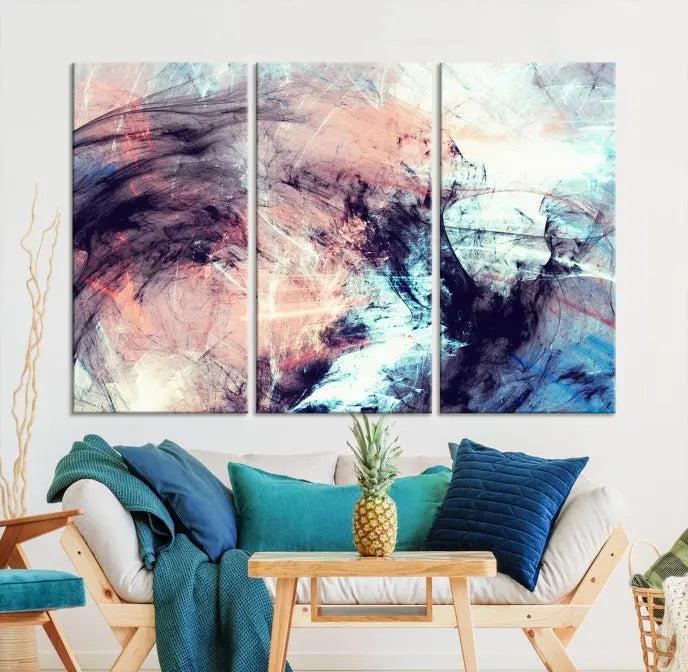 The Abstract Colors Wall Art Canvas Print features a triptych design with swirling purple, pink, and blue hues. This museum-quality piece on polycotton canvas is expertly hand-assembled and comes ready to hang.