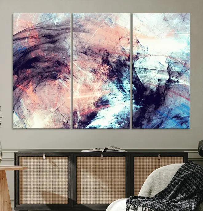 The Abstract Colors Wall Art Canvas Print features a triptych design with swirling purple, pink, and blue hues. This museum-quality piece on polycotton canvas is expertly hand-assembled and comes ready to hang.