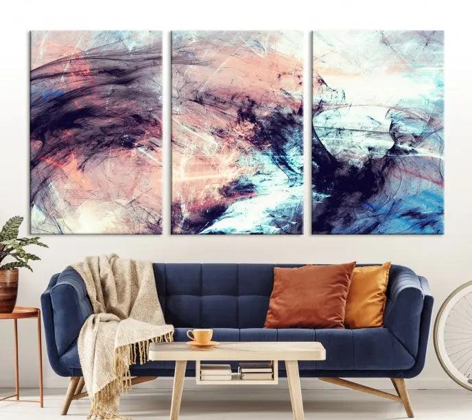 The Abstract Colors Wall Art Canvas Print features a triptych design with swirling purple, pink, and blue hues. This museum-quality piece on polycotton canvas is expertly hand-assembled and comes ready to hang.