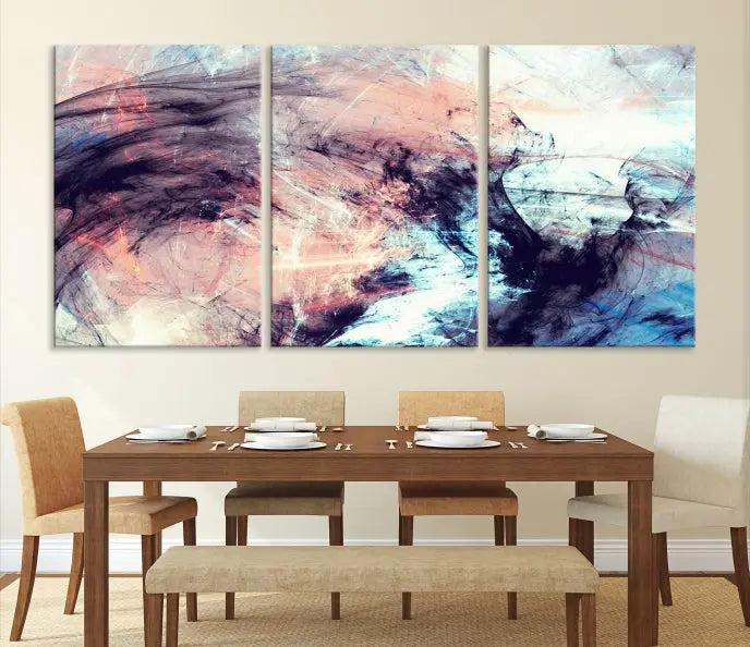 The Abstract Colors Wall Art Canvas Print features a triptych design with swirling purple, pink, and blue hues. This museum-quality piece on polycotton canvas is expertly hand-assembled and comes ready to hang.