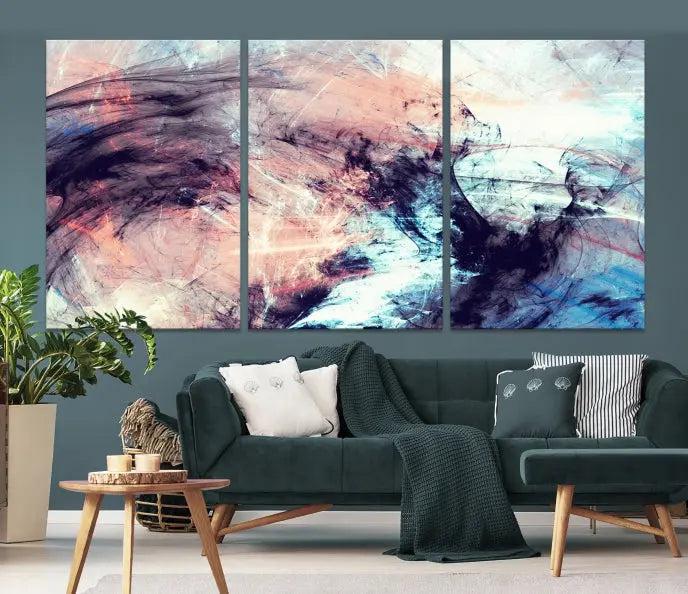 The Abstract Colors Wall Art Canvas Print features a triptych design with swirling purple, pink, and blue hues. This museum-quality piece on polycotton canvas is expertly hand-assembled and comes ready to hang.