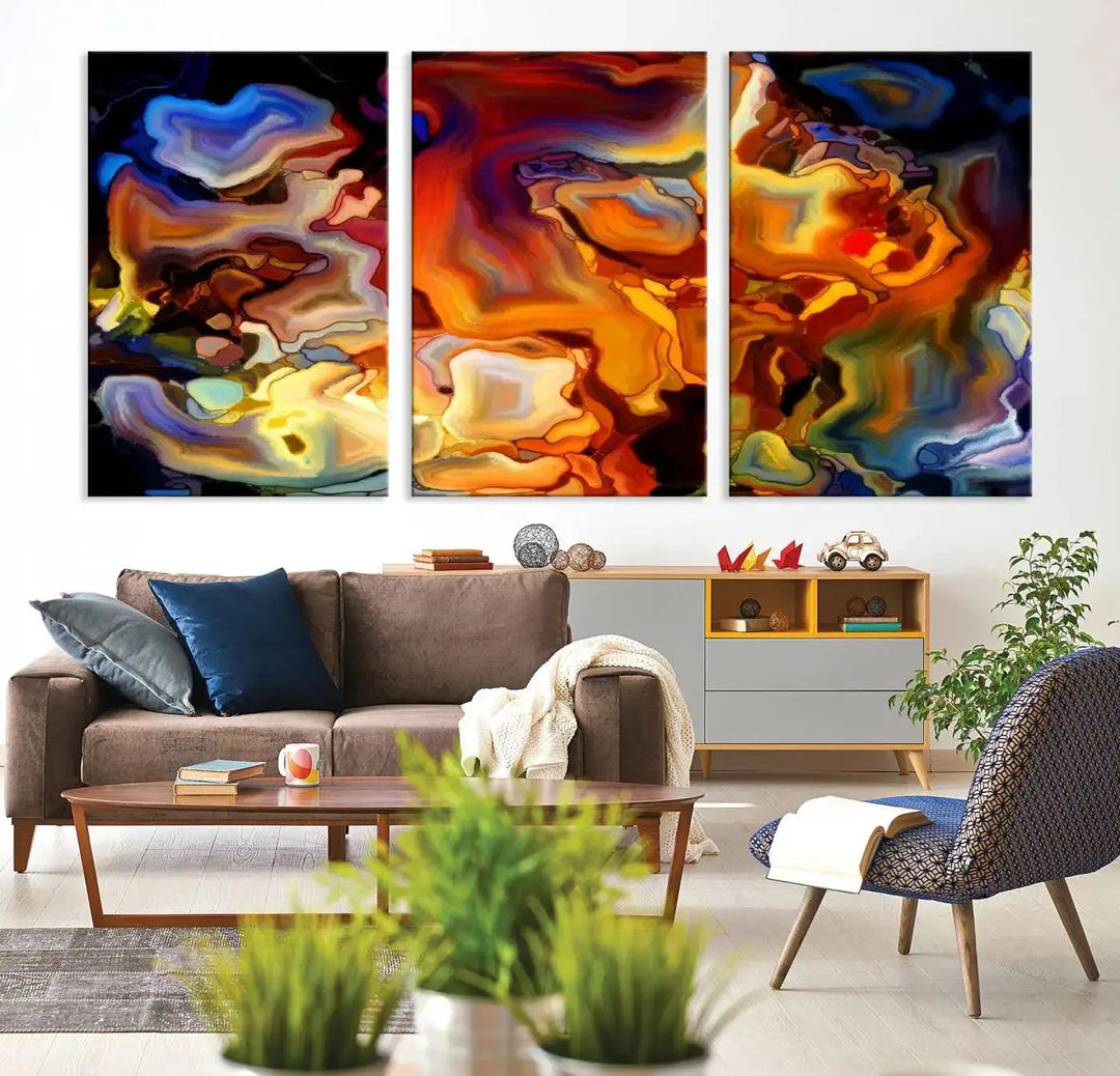 The living room features the Abstract Flames Canvas Wall Art Print, showcasing a vibrant abstract marble design on a gallery-wrapped, museum-quality canvas.