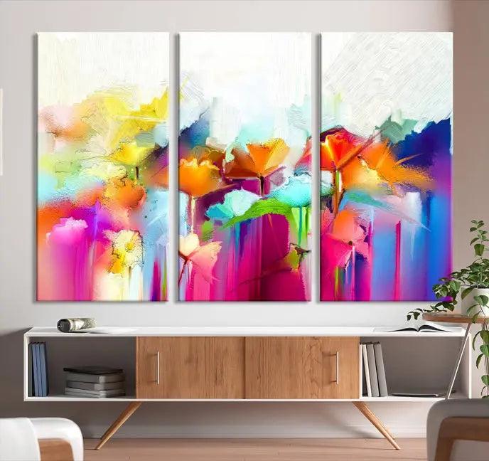 The space is beautifully adorned with the "Abstract Flower" triptych, gallery-wrapped on museum-quality polycotton canvas, creating a cozy setting.