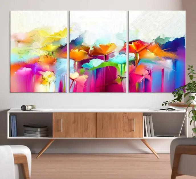 The space is beautifully adorned with the "Abstract Flower" triptych, gallery-wrapped on museum-quality polycotton canvas, creating a cozy setting.