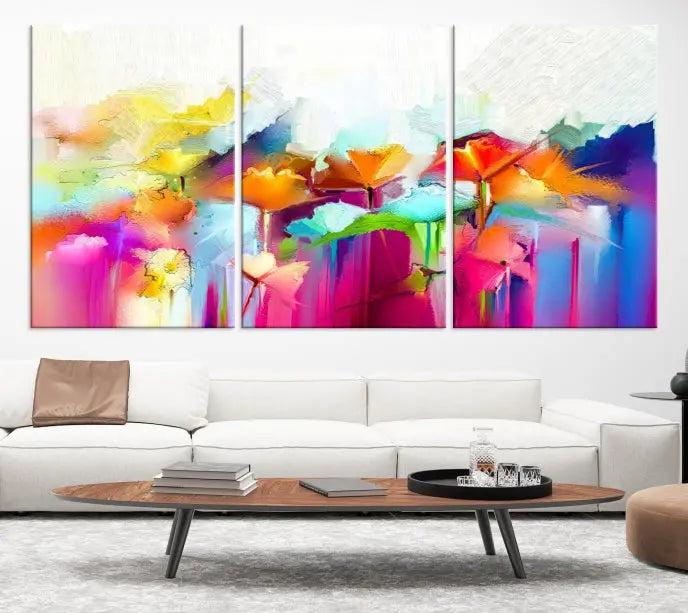 The space is beautifully adorned with the "Abstract Flower" triptych, gallery-wrapped on museum-quality polycotton canvas, creating a cozy setting.