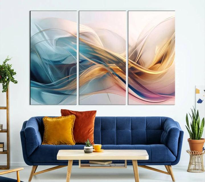 The Abstract Flowing Colors Wall Art, featuring swirling lines in blue, gold, and pink, brings a touch of modern elegance to the space. It's ideal for those who appreciate contemporary decor and want to make a bold statement.