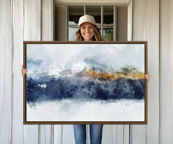 A stunning Abstract Mountain Range Art Canvas Print in a 3-panel watercolor landscape design is displayed on the wall.
