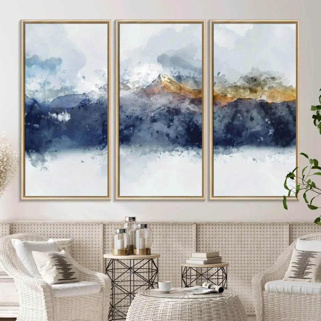 A stunning Abstract Mountain Range Art Canvas Print in a 3-panel watercolor landscape design is displayed on the wall.