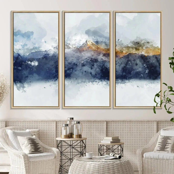 A stunning Abstract Mountain Range Art Canvas Print in a 3-panel watercolor landscape design is displayed on the wall.