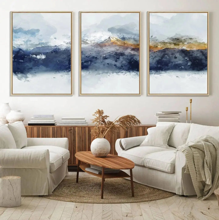 A stunning Abstract Mountain Range Art Canvas Print in a 3-panel watercolor landscape design is displayed on the wall.