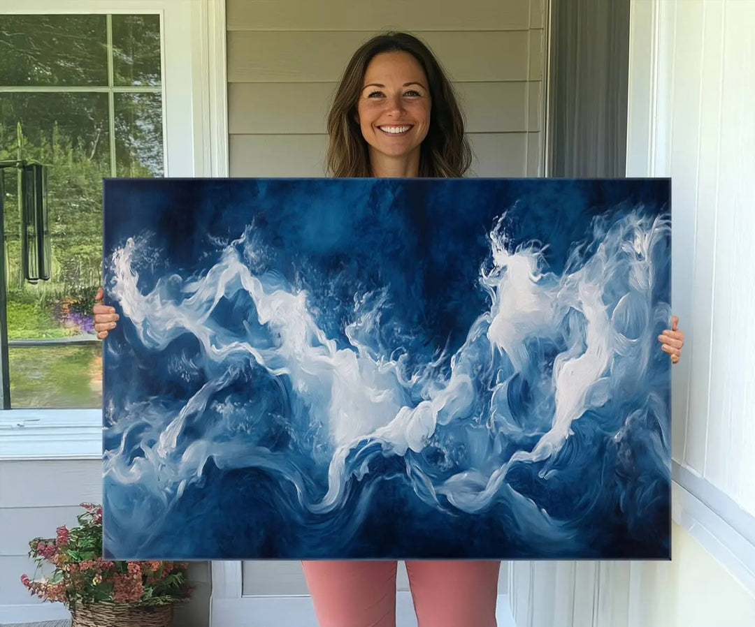 The room features an Abstract Ocean Storm Canvas Art in deep blue and white.